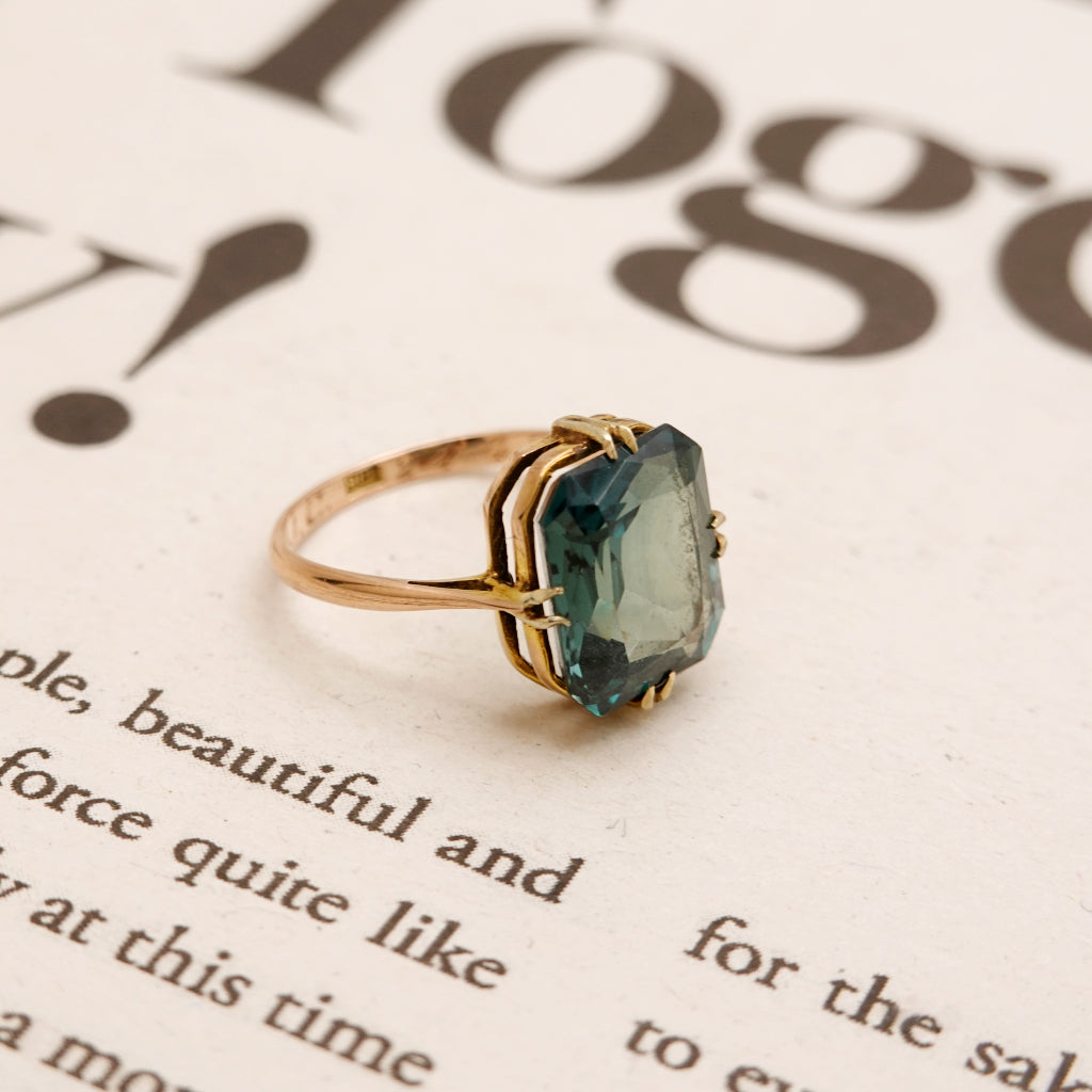 Vintage gold ring on sale with green stone